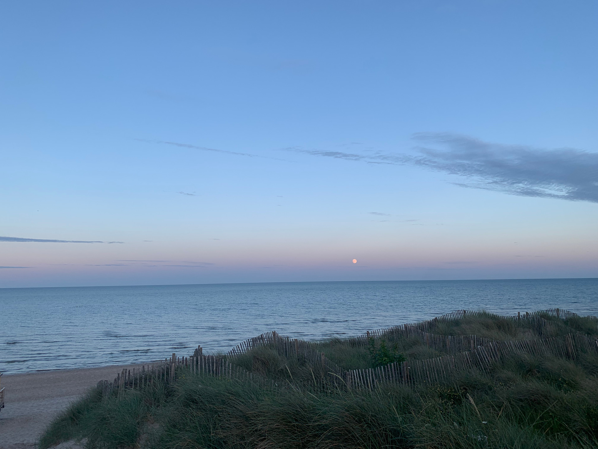 The moon rising over the Irish Sea